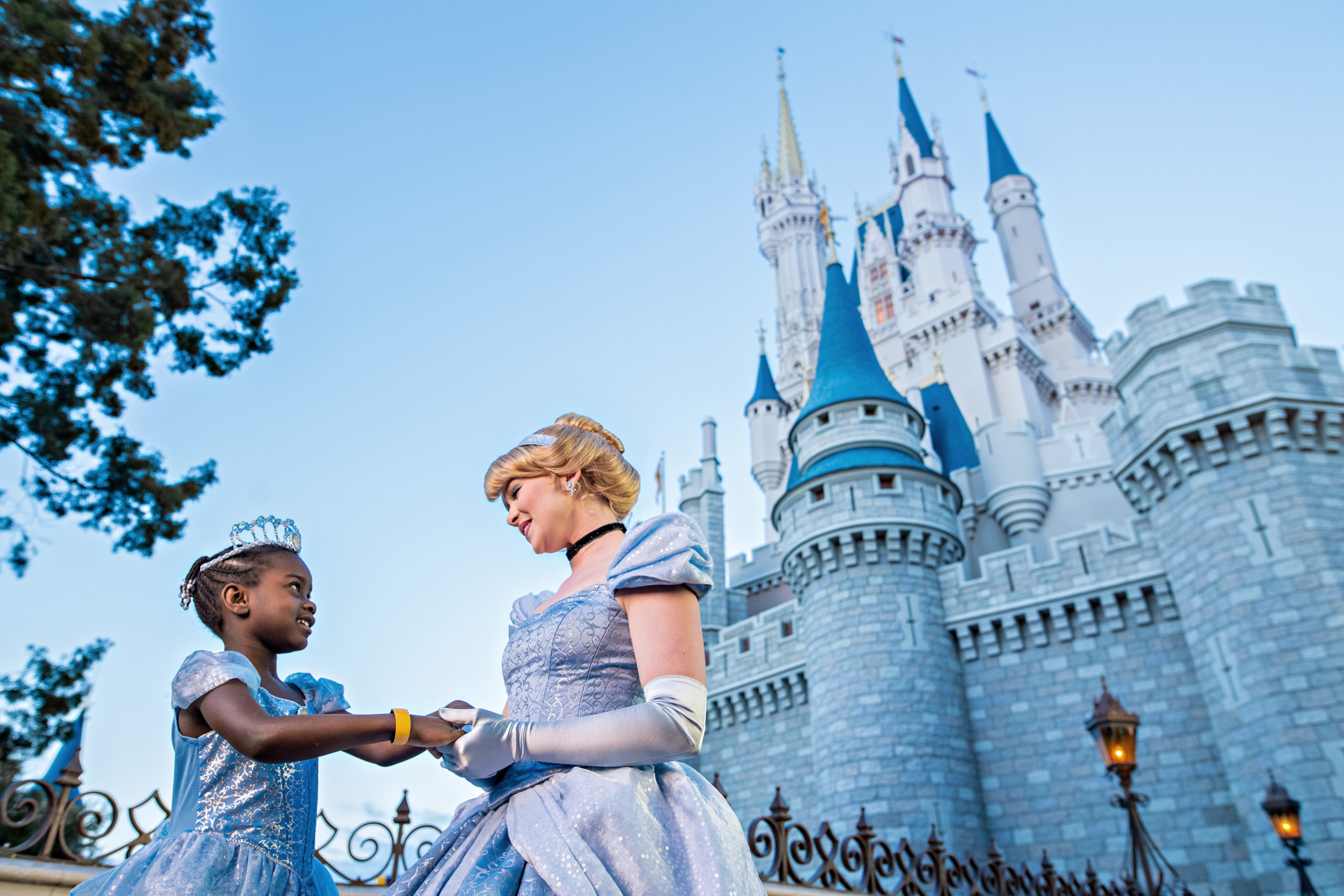 Disney Castle - Woman holding hands with little girl2